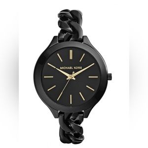 Michael Kors Women’s black and gold watch. New with tags in box.
